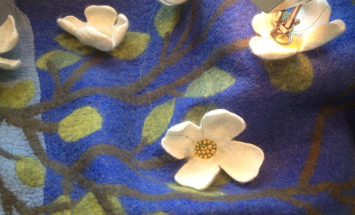 Of course, I had to add a few punches of free-motion embroidery to the center to detail the little yellow flowers