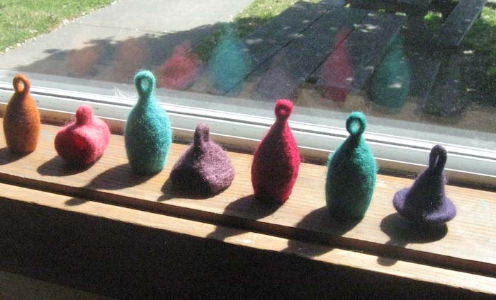 Participants' studies developing hollow form bell shapes with hanging bails, Point Reyes workshop, CA, 2013