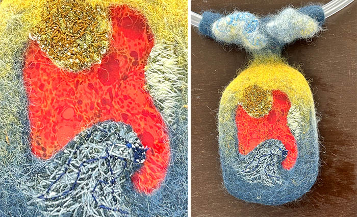 Ann Janssens textural free-motion machine stitching to frame the intricate detail of the encased glass piece | Vrouw Wolle, Essen, Belgium 2026