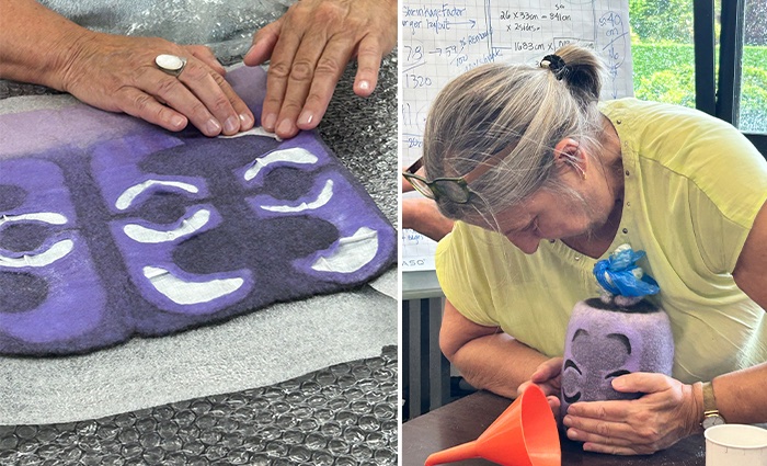 Mieke Colruyt agitating her resist textured cylinder alongside her blocking her completed vessel | Vrouw Wolle, Essen, Belgium 2026