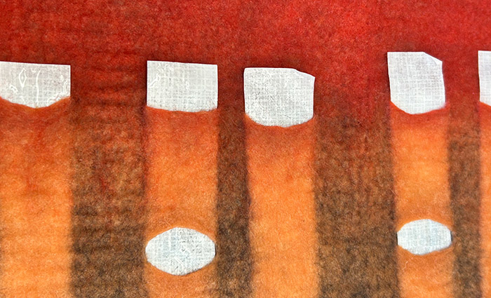 STRONGFELT work demonstrating use of resists to create surface textures through reverse cutting and to block color blending in specified areas for defined surface patterning