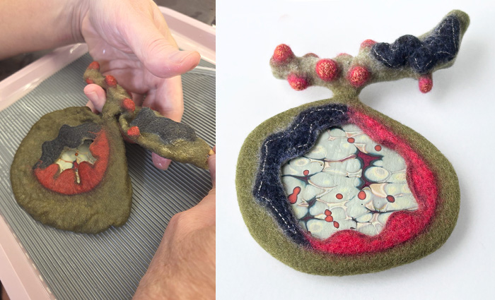 STRONGFELT work fulling a partial felt bezeled glass cabochon with a bail tube sculpted with differential shrinkage